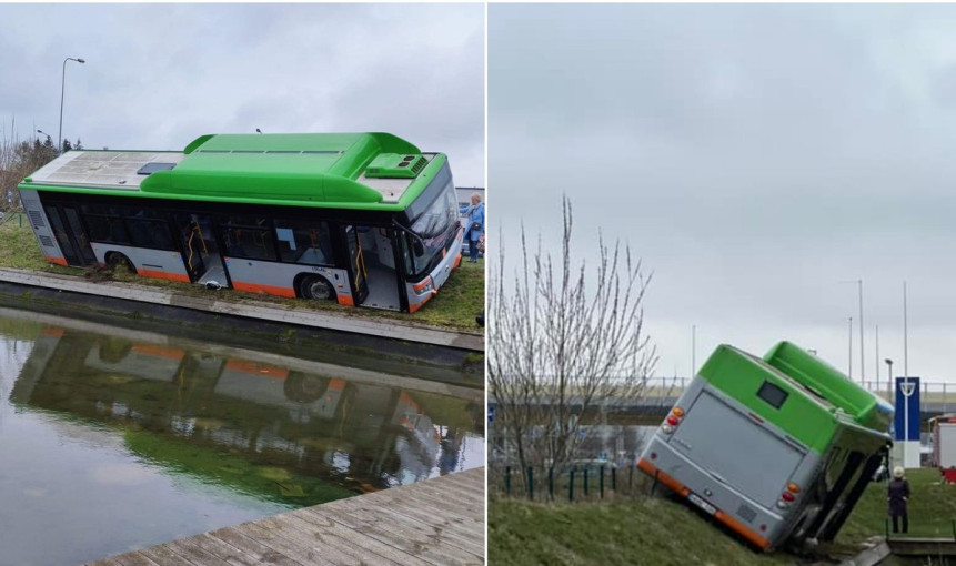Avarija Klaipėdoje: nuo šlaito nuriedėjęs autobusas vos neatsidūrė tvenkinyje