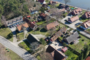 Aukcione už 1,35 mln. eurų parduotas žvejo namas Neringoje